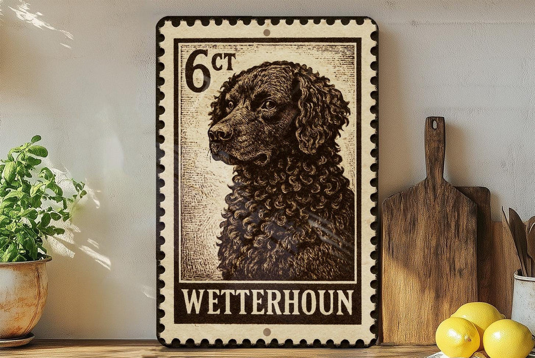 A framed image of a dog, specifically a black curly-haired breed, is displayed on a shelf next to a wooden cutting board and some kitchen utensils.