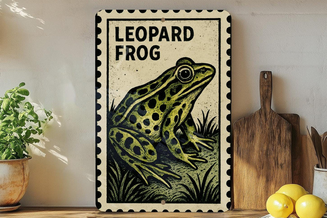 A framed illustration of a leopard frog is displayed on a shelf, accompanied by a wooden cutting board and a potted plant.
