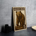 A brown bear stamp with the number 5 on it, placed on a table next to some black camera lenses.
