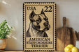A metal sign featuring an American Staffordshire Terrier, with a US postage stamp in the background.