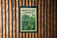 A poster for the Monstera Garden, featuring a large image of monstera plants and a price tag of 50 cents.