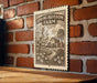 A sign for "Spring Blossom Farm" is displayed on a brick wall, featuring an illustration of a farm scene with a house and trees.