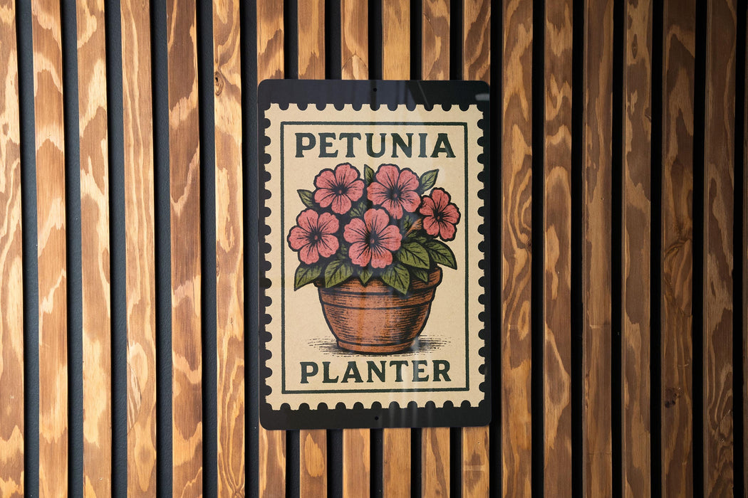 A sign with the text "PETUNIA PLANTER" and an illustration of a potted plant with pink flowers.