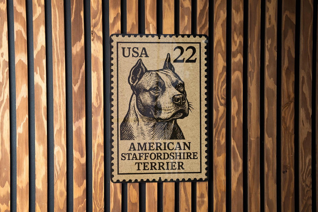 A US postage stamp featuring an American Staffordshire Terrier dog.