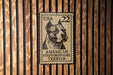 A US postage stamp featuring an American Staffordshire Terrier dog.