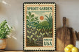 A vintage-style metal sign with a garden scene and the text "SPROUT GARDEN FOREVER USA" displayed on a shelf.