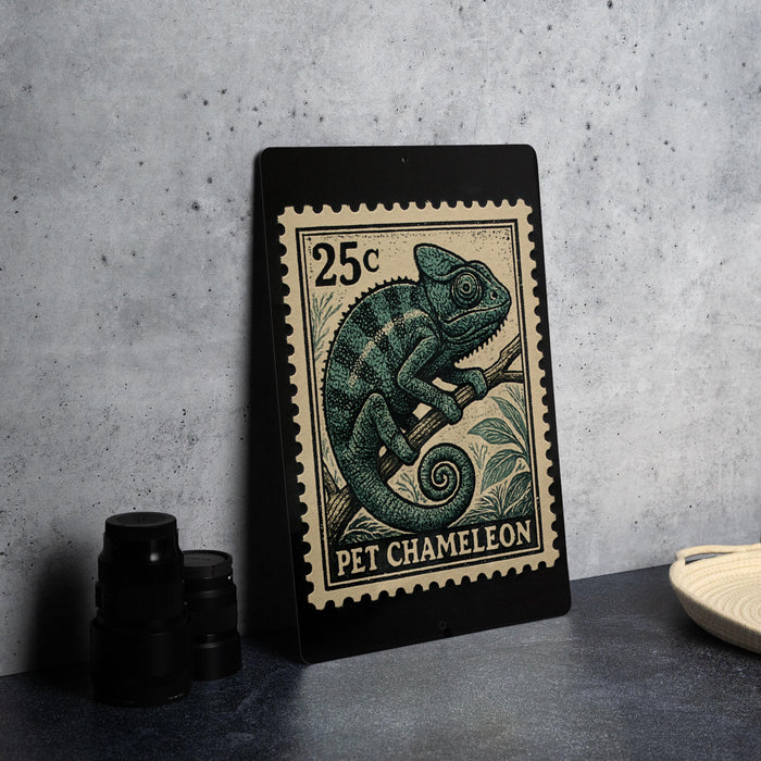 A 25c postage stamp featuring a chameleon illustration, placed on a black surface next to some black camera lenses.
