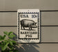 A sign on a wall that reads "USA 10¢ Barnyard Pig" with a pig illustration.