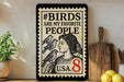 A framed poster with the text "#BIDS ARE MY FAVORITE PEOPLE" and an illustration of a woman with birds perched on her shoulders.