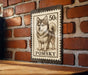 A 50 cent stamp featuring a pomeranian dog on a brick wall.