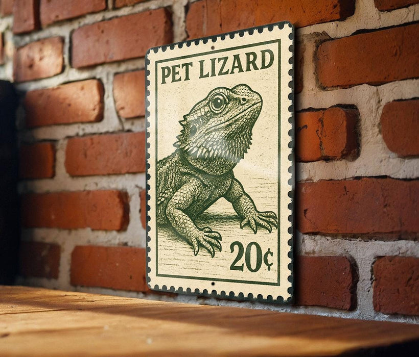 A metal sign with a drawing of a pet lizard, mounted on a brick wall.