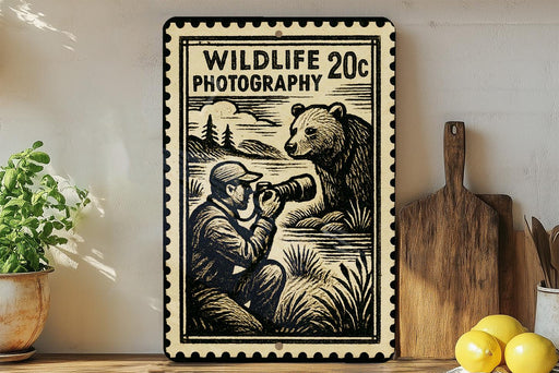 A framed print featuring a photographer taking a picture of a bear, with the text "Wildlife Photography" and "20c" printed on it.