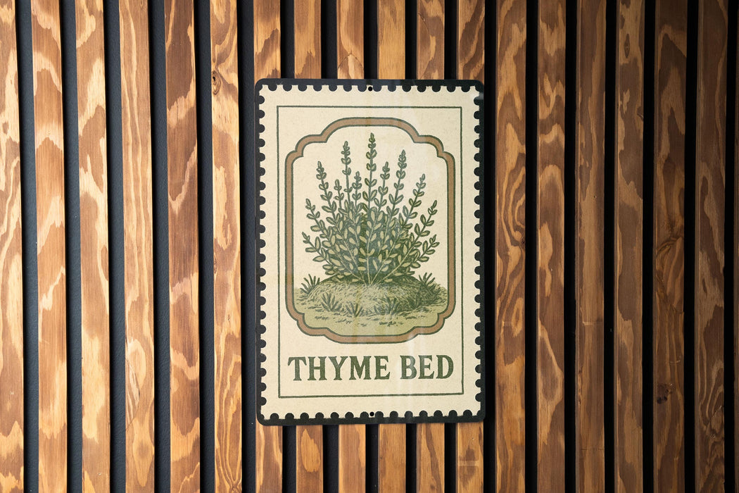 A vintage-style metal sign with a thyme plant illustration is mounted on a wooden wall.