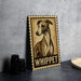 A metal sign featuring a drawing of a dog, with the word "Whippet" written below it.