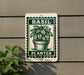 A green and white sign with a basil plant illustration is mounted on a wall, with a plant visible to the left.