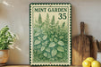 A framed illustration of mint plants is displayed on a shelf, accompanied by kitchen utensils and a potted plant.