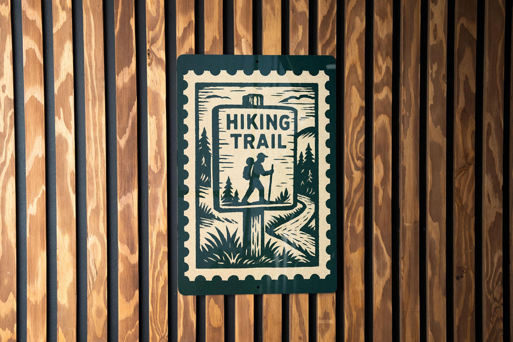A sign that reads "HIKING TRAIL" is displayed on a wooden wall.
