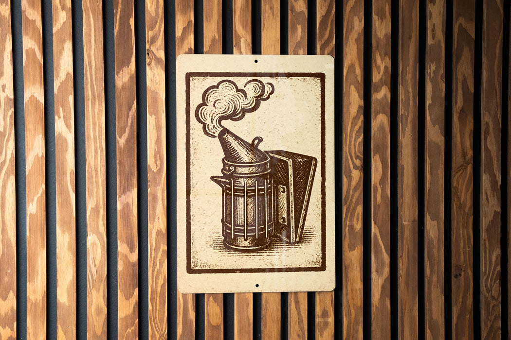 a wooden panel with a metal object, possibly a tool or device, depicted on it.