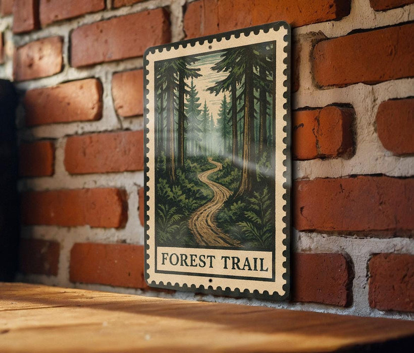 A metal sign with a forest trail illustration is mounted on a brick wall.