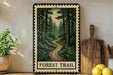 a framed illustration of a forest trail, with the text "FOREST TRAIL" prominently displayed. The frame is placed on a wooden surface, with a potted plant to the left and a wooden cutting board to the right.