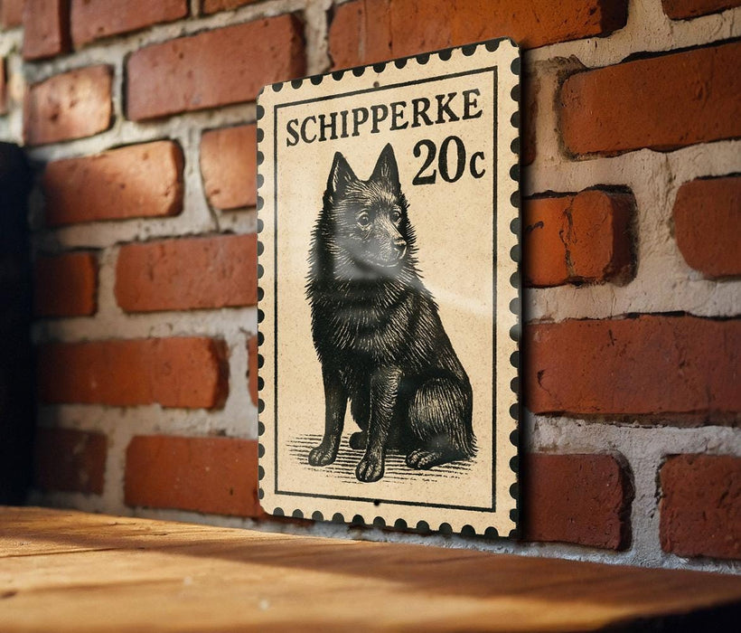 A black and white illustration of a dog, likely a Schipperke breed, is mounted on a brick wall.
