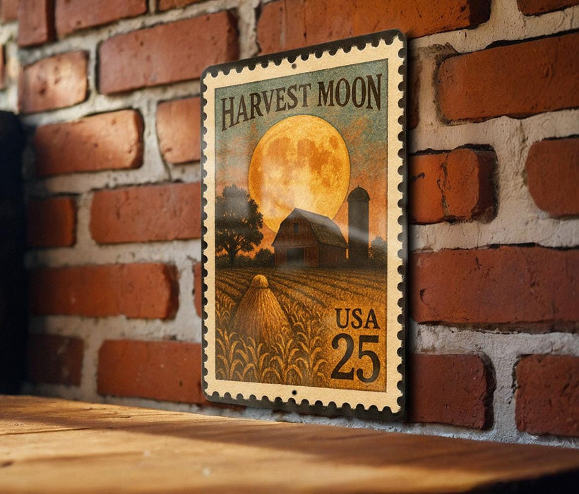 A vintage-style stamp depicting a farm scene with a full moon and a barn, mounted on a brick wall.