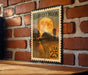 A vintage-style stamp depicting a farm scene with a full moon and a barn, mounted on a brick wall.