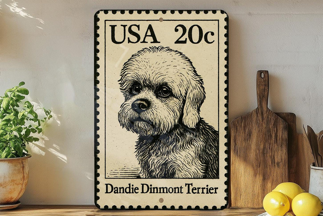 A vintage-style metal sign featuring a dandie dinmont terrier, with a postage stamp-like design, is displayed on a wooden shelf next to a potted plant and a wooden cutting board.