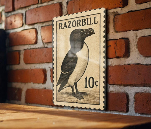 A vintage-style postage stamp featuring a black and white illustration of a bird, mounted on a brick wall.