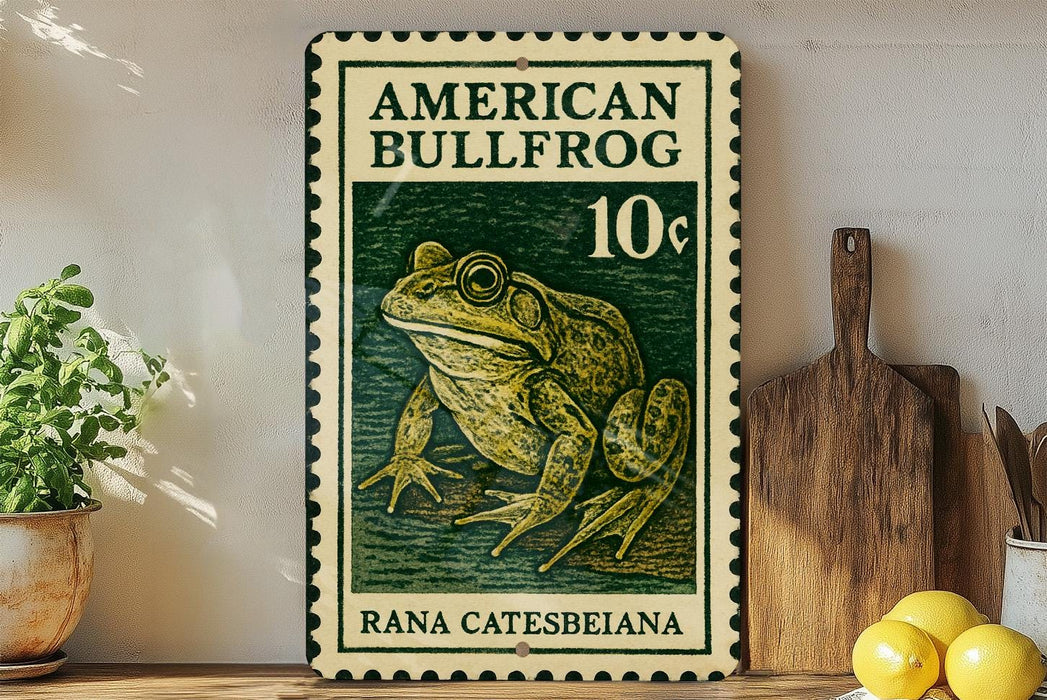 A vintage American Bullfrog stamp featuring a detailed illustration of the frog, placed on a wooden surface next to a wooden cutting board and a potted plant.