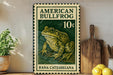 A vintage American Bullfrog stamp featuring a detailed illustration of the frog, placed on a wooden surface next to a wooden cutting board and a potted plant.