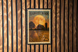 A United States postage stamp depicting a rural scene with a full moon, a barn, and a field of crops.