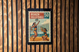 A vintage-style stamp depicting two women playing beach volleyball, with the text "BEACH VOLLEYBALL 50" on it.
