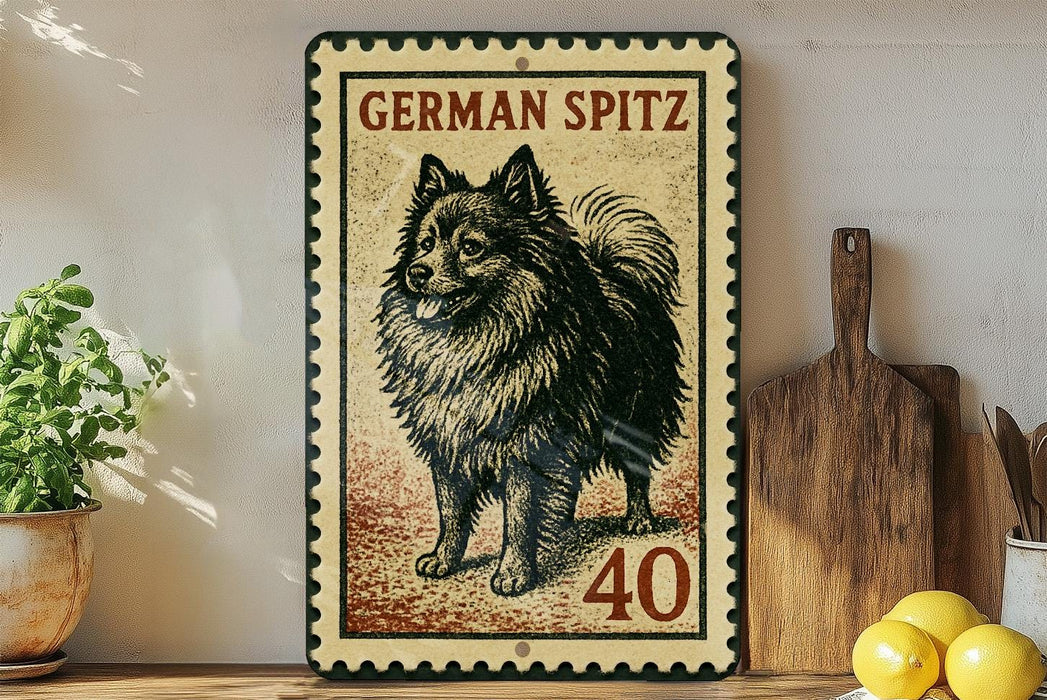 a German Spitz dog, a breed of small, long-haired, and curly-haired dogs, standing on a wooden surface.