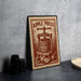 a vintage-style stamp or sign with the text "APPLE PRESS" and an illustration of a wooden press or juicer.