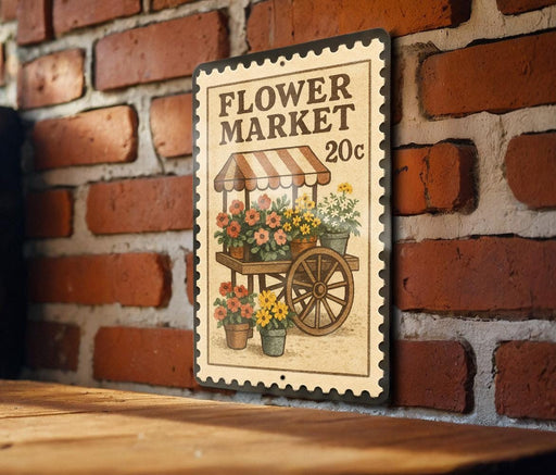 A vintage-style metal sign for a flower market, featuring an illustration of a flower cart and various flowers.