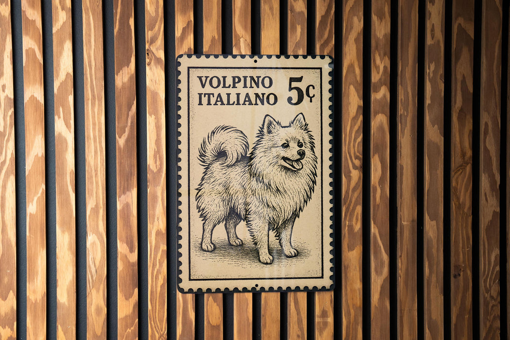 A vintage postage stamp featuring a dog, with the text "VOLPINO ITALIANO 5¢" printed on it.