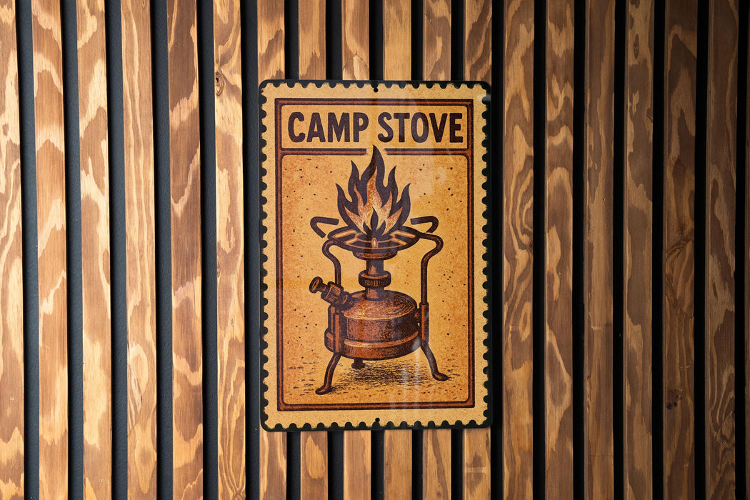 A metal sign with a flame on it is mounted on a wooden wall.