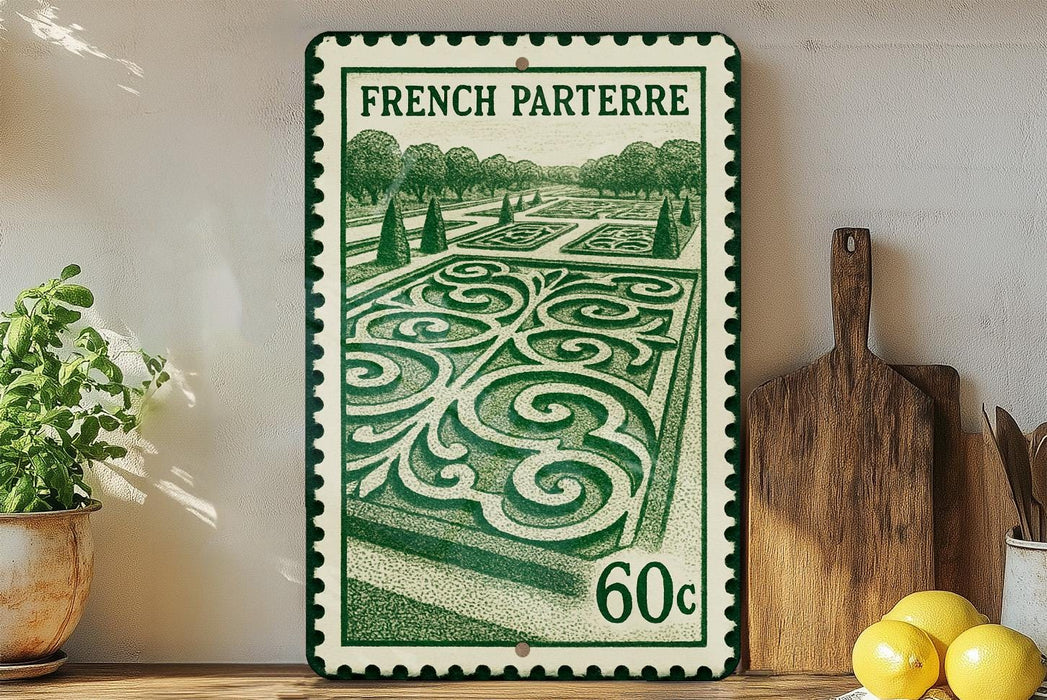 A French postage stamp featuring a garden scene, with a potted plant and kitchen utensils visible in the foreground.