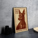 A metal stamp featuring a miniature pinscher dog, with the text "32 USA" and "MINIATURE PINSCHER" printed on it.