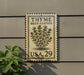 A sign for the Thyme Herb Garden in the USA.
