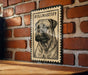 A metal sign featuring a bull mastiff dog is mounted on a brick wall.