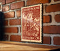 A vintage U.S. postage stamp depicting a cherry picking scene, mounted on a brick wall.