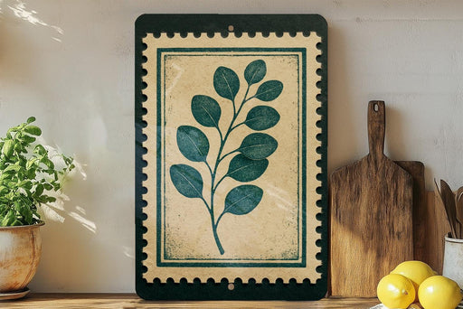 a framed print of a plant with green leaves, placed on a shelf next to a wooden cutting board and a potted plant.
