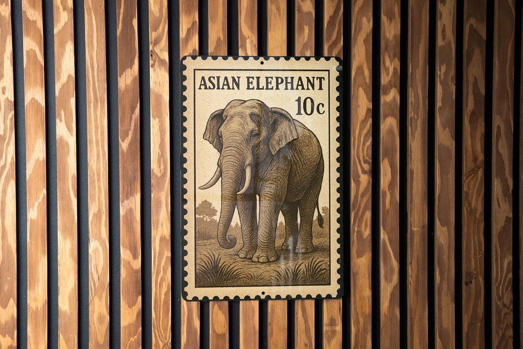a large Asian elephant stamp mounted on a wooden wall.