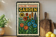 A colorful garden-themed sign with a variety of flowers and plants displayed on a shelf, accompanied by a wooden cutting board and some lemons.