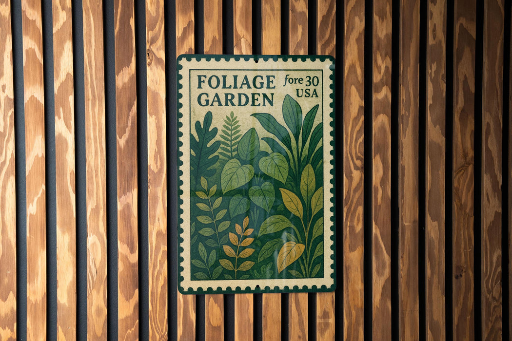 a vintage-style postage stamp with a lush green plant illustration, mounted on a wooden wall.