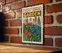 A colorful garden-themed sign is displayed on a brick wall, featuring illustrations of flowers and plants.