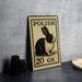 A metal sign with a rabbit illustration and the text "POLISH 20 GR" is displayed on a table.