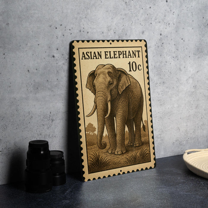 A metal stamp featuring an illustration of an elephant, with the text "ASIAN ELEPHANT 10c" printed on it.